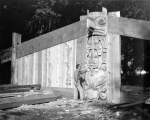 Bill Reid with Haida longhouse