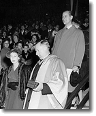 Princess Elizabeth, Mackenzie, and Prince Philip leaving the stadium